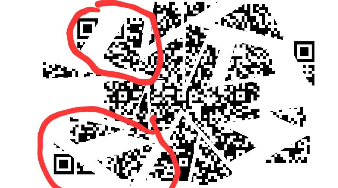 Fragmented QR code with two groups of neighboring pieces highlighted in red